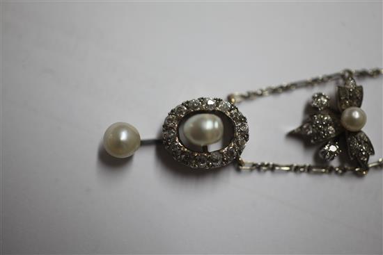 An Edwardian gold and silver, diamond and cultured? pearl drop necklace, pendant section 42mm.